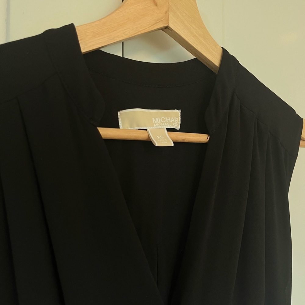 Michael Kors Elegant Black Jumpsuit with Buttoned Front and Pockets